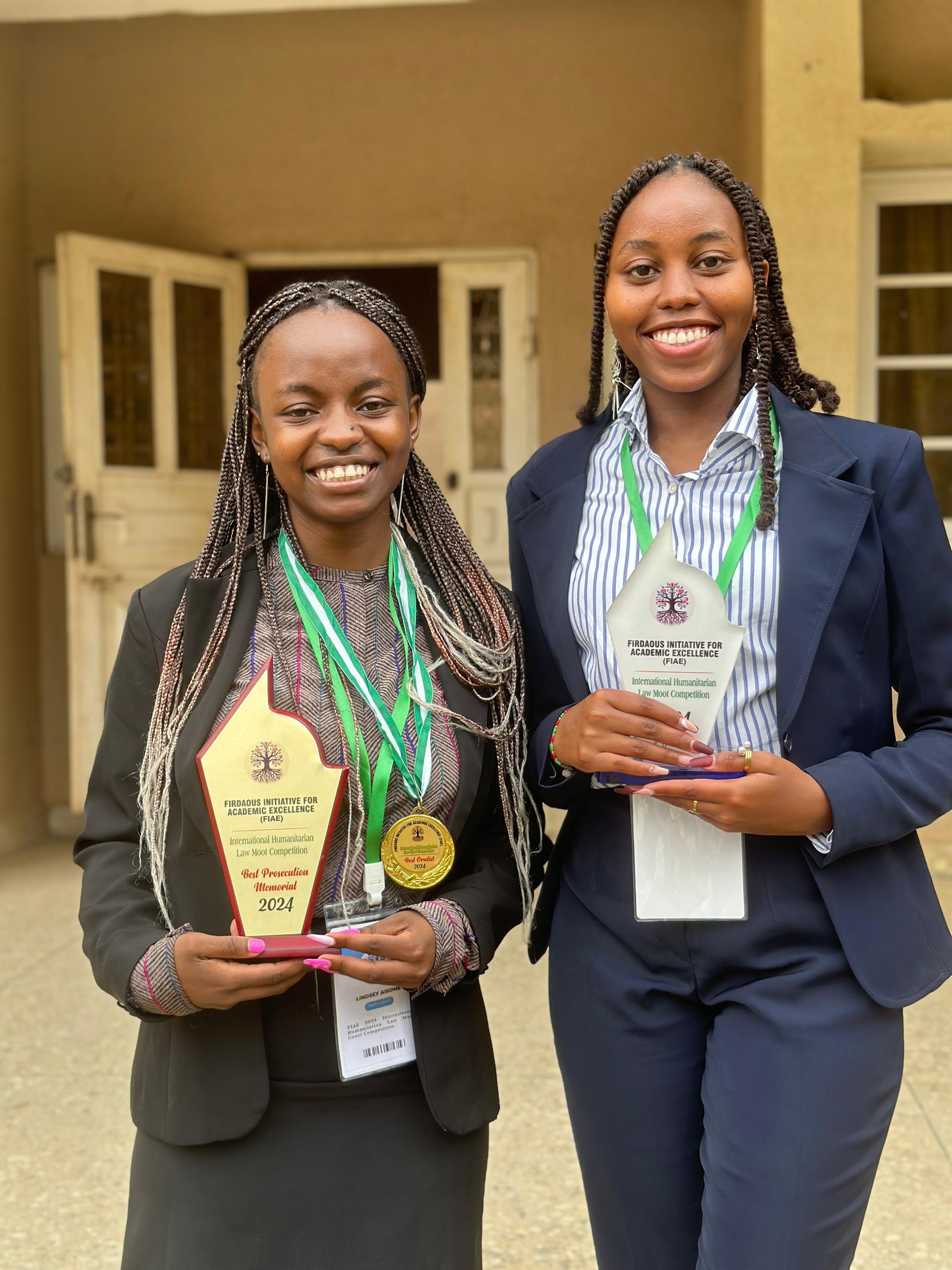 team Lindsey Asiome  & Mercy Kamau clinched Best Overall Team at the FIS International Humanitarian Law Moot
