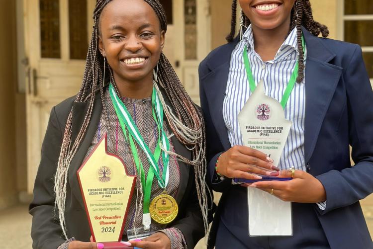 team Lindsey Asiome  & Mercy Kamau clinched Best Overall Team at the FIS International Humanitarian Law Moot